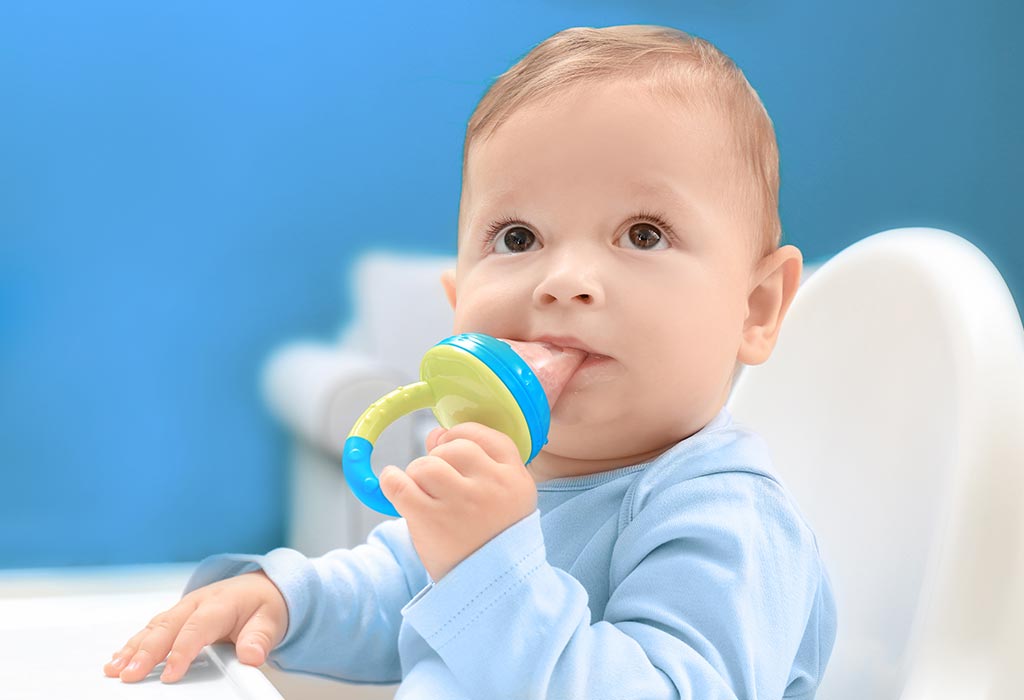 Palmar Grasp Reflex - baby holding a nibbler