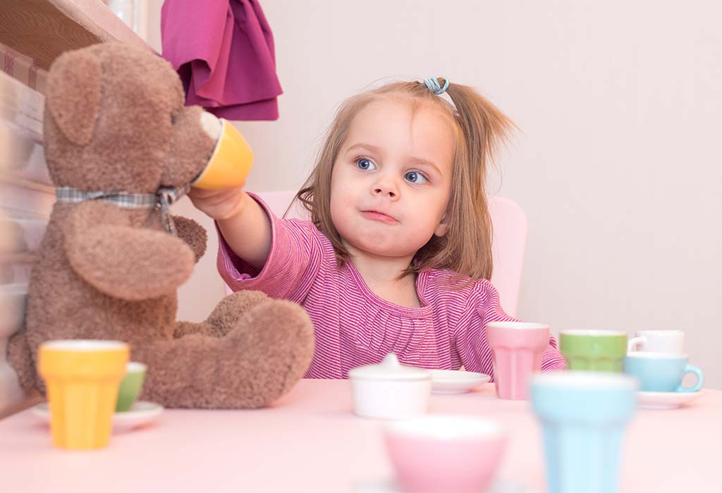 Child playing with toys and imaginary friends
